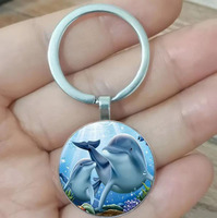 1 cute dolphin moon keychain, fashionable animal keychain, perfect Christmas party and holiday jewelry gift for men and women