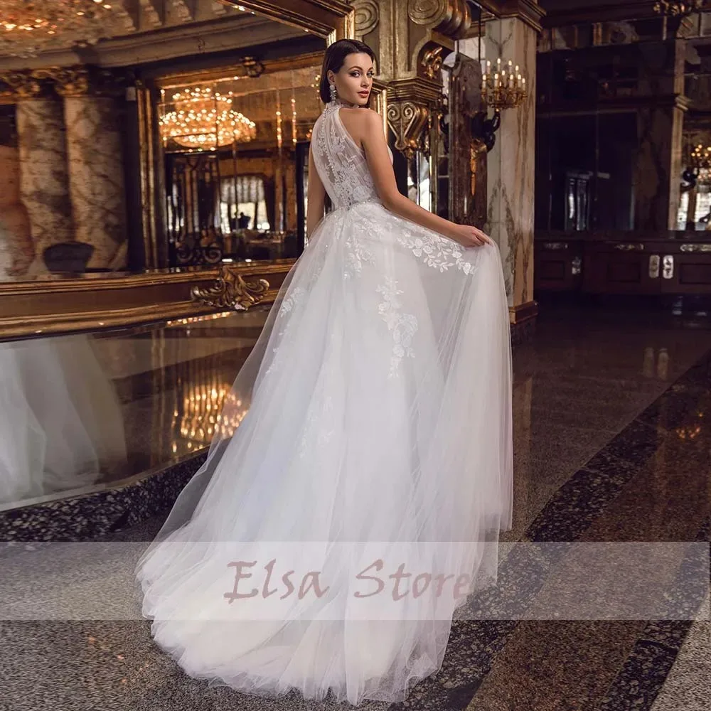 Bohemian Wedding Dresses 2025 New Lace Appliques Halter Bridal Gown Sleeveless Beaded A-Line Button Illusion Tulle Bride Dress