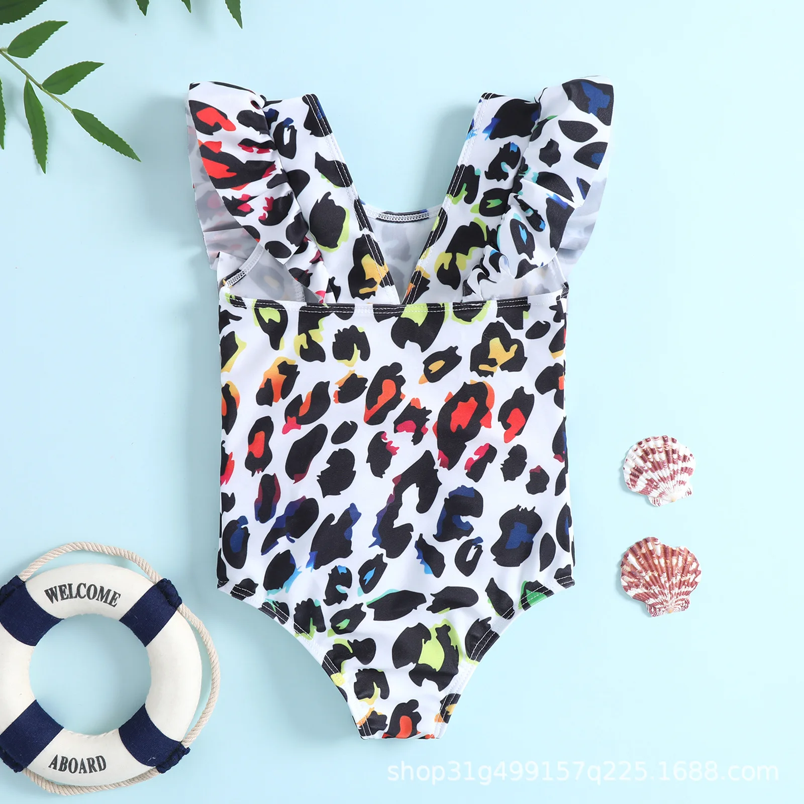 Toddler one piece swimsuit with ruffle decor and colorful leopard print for pool and beach play