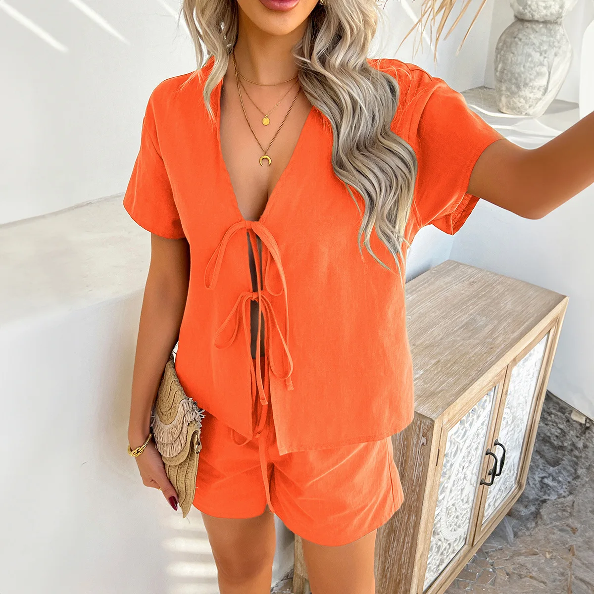 

Весна и лето 2025 г., повседневный однотонный праздничный стиль, топ на шнуровке с короткими рукавами, короткие брюки, костюм, женская одежда