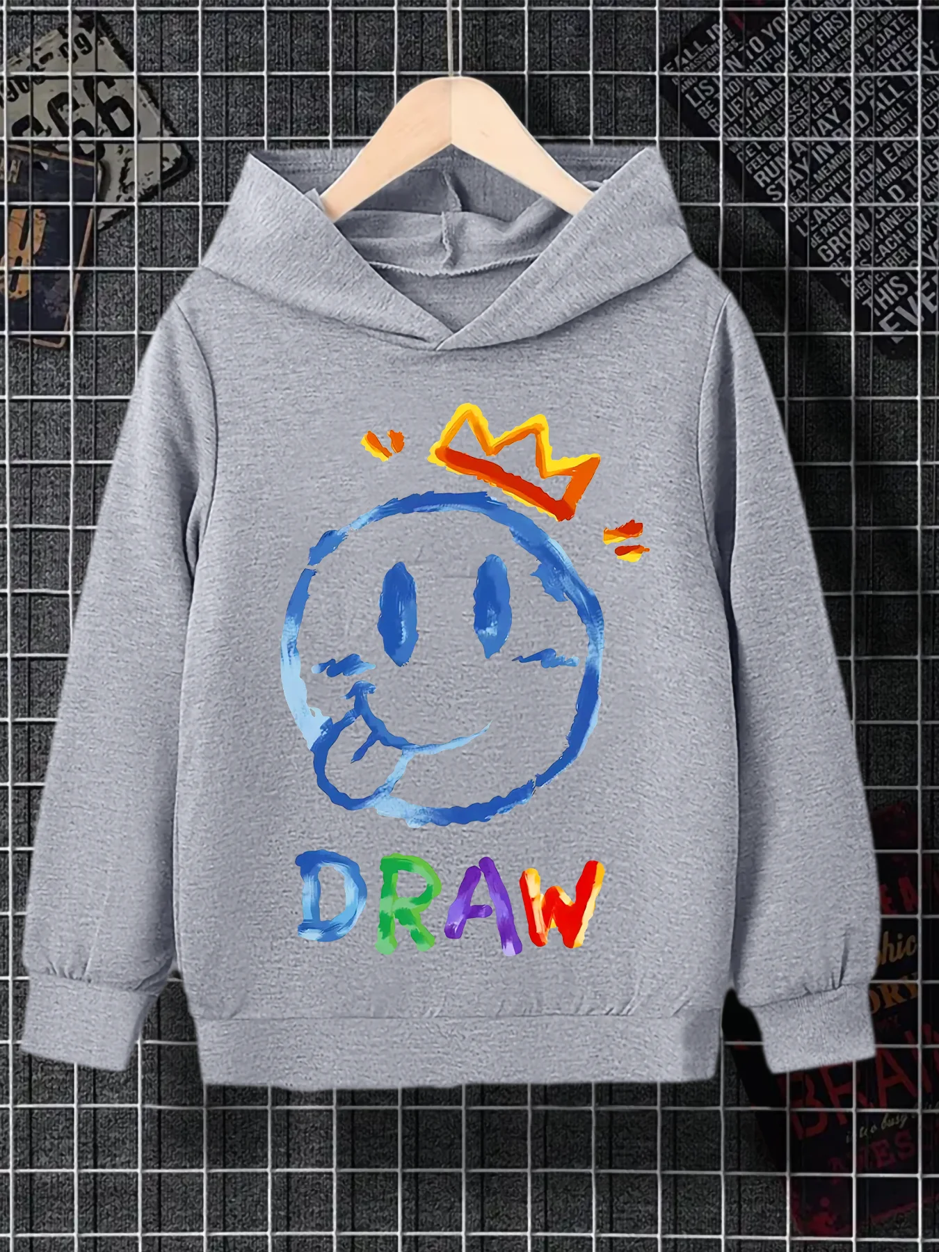

A Casual And Simple Grey Hooded Sweatshirt For Boys With A Smiling Face Graffiti Pattern Print, Suitable For Daily Outings