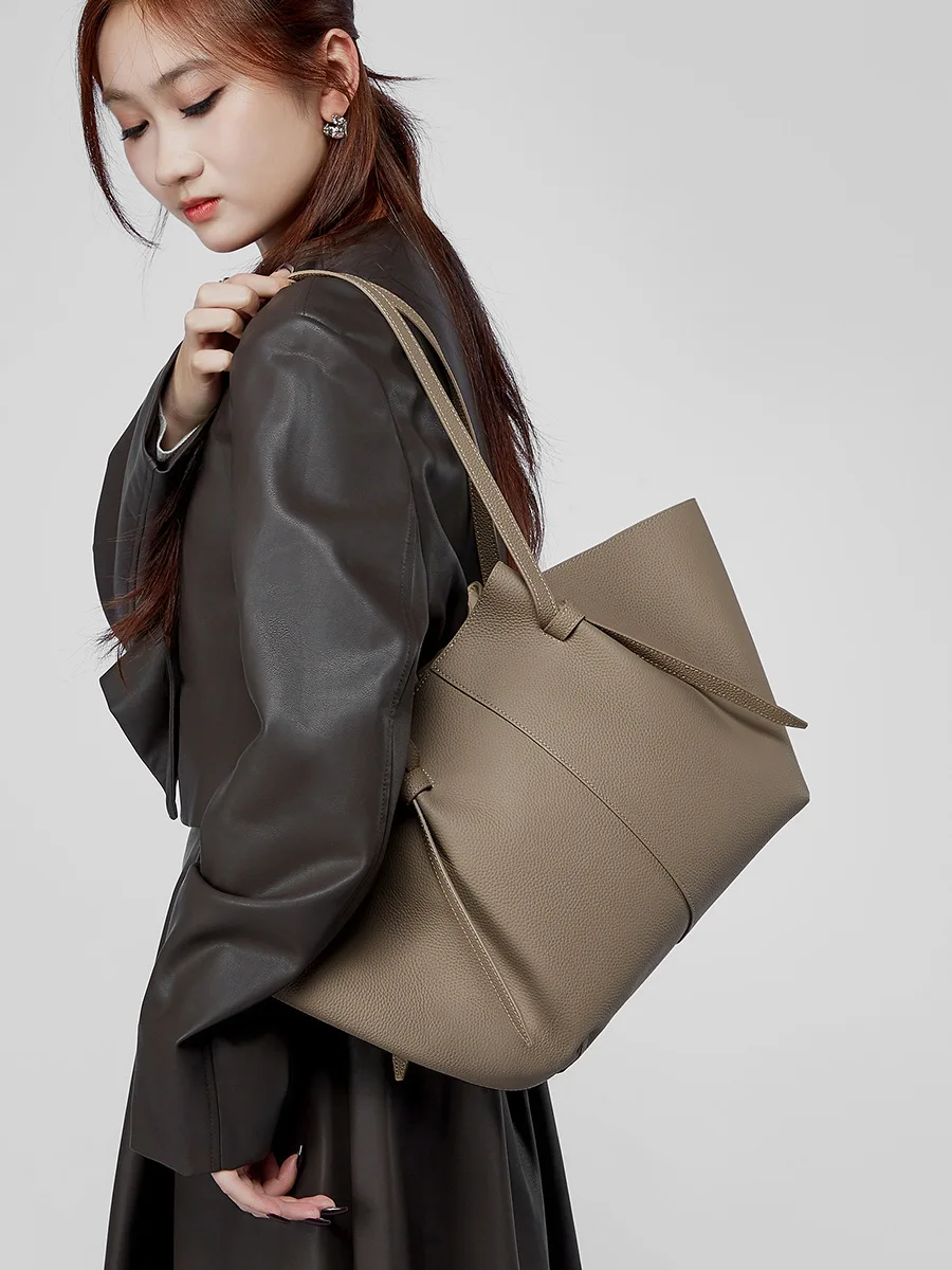 Cowhide large capacity tote bag genuine leather women's bag  fashionable bat bag commuting shoulder bags hand-held wing bag