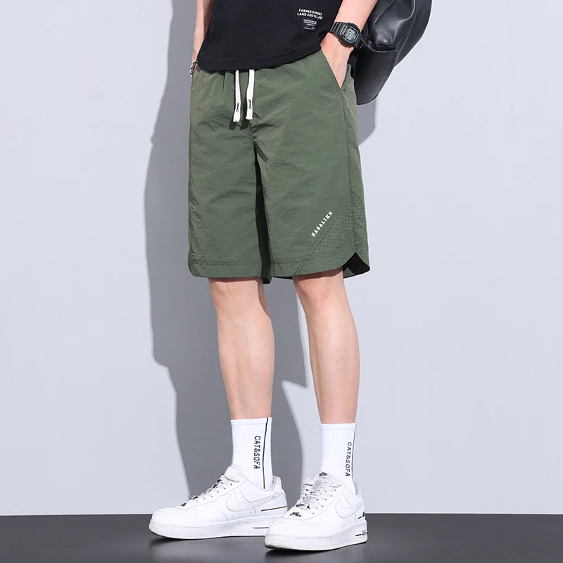 Fashion Elastic Spliced Printing Letter Casual Shorts Men\'s Clothing 2024 Summer New Loose Solid Color All-match Knee Shorts