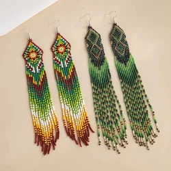 Beaded earrings Tassel Geometry Design Gradient Originality Hand knitting Bohemia Alloy Tide Simple Rice bead earrings