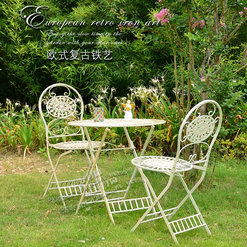 European cast iron high-end tables and chairs foldable wrought iron retro old outdoor garden balcony tables and chairs