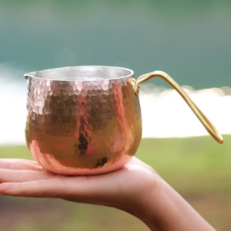 

The product can be customized. Handmade pure copper small milk pot, purple copper cute coffee sharing pot, red coppe