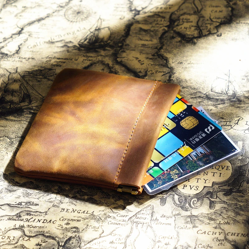 

Vintage Genuine Cowhide Small Storage Bag Female Carry-on Mini Coin Purse Cosmetic Bag
