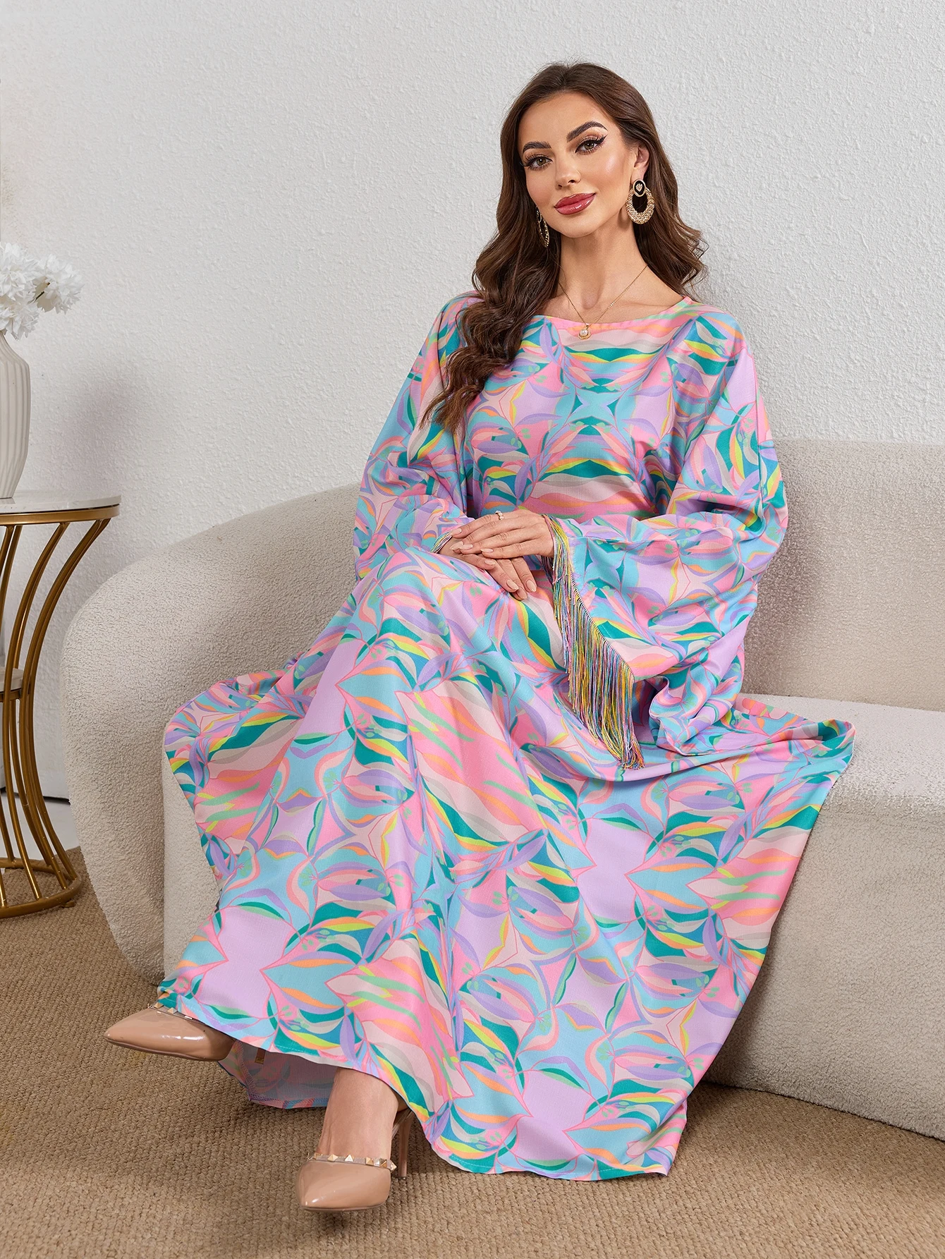 

Colorful Muslim Abaya with Vibrant Abstract Prints and Tassel - adorned Sleeves for a Women Stylish and Playful Look 2025 New