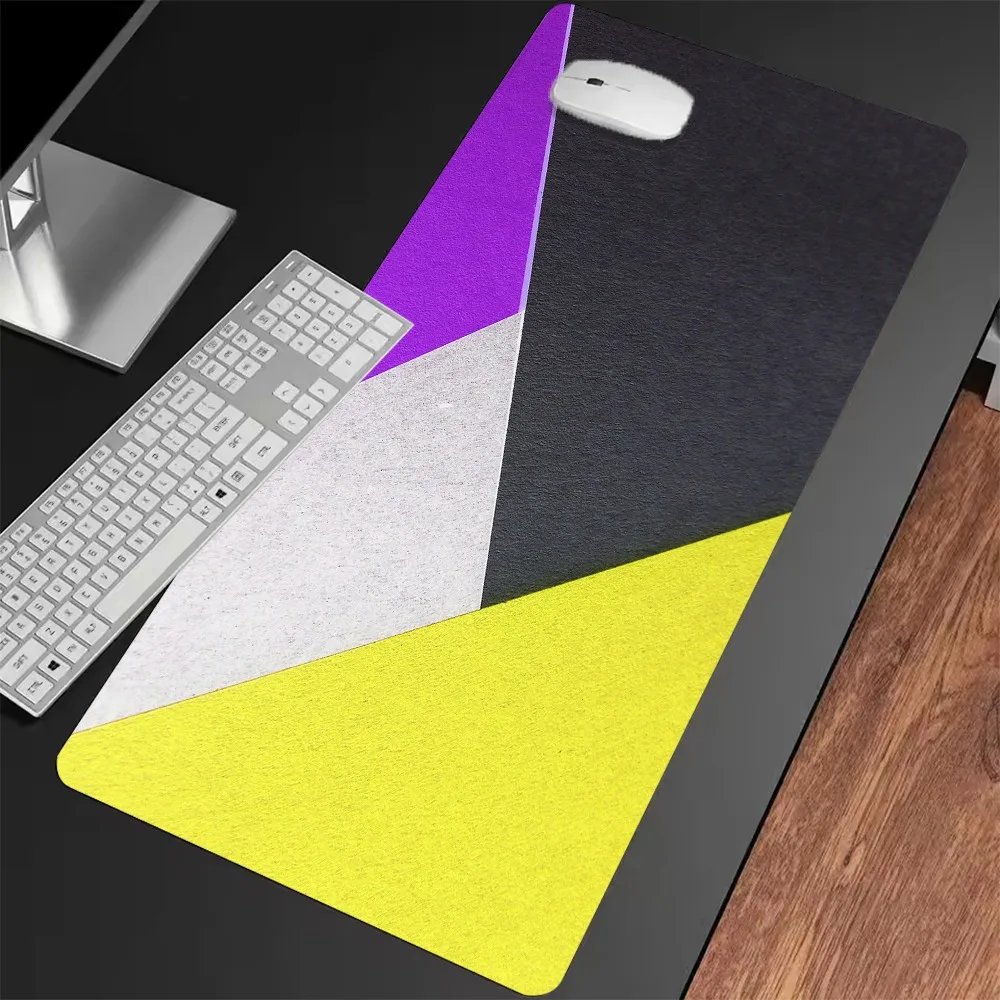 Geometric Extended Desk Pad A mouse pad with both fashion and functionality with bright purple gray and yellow contrasting color