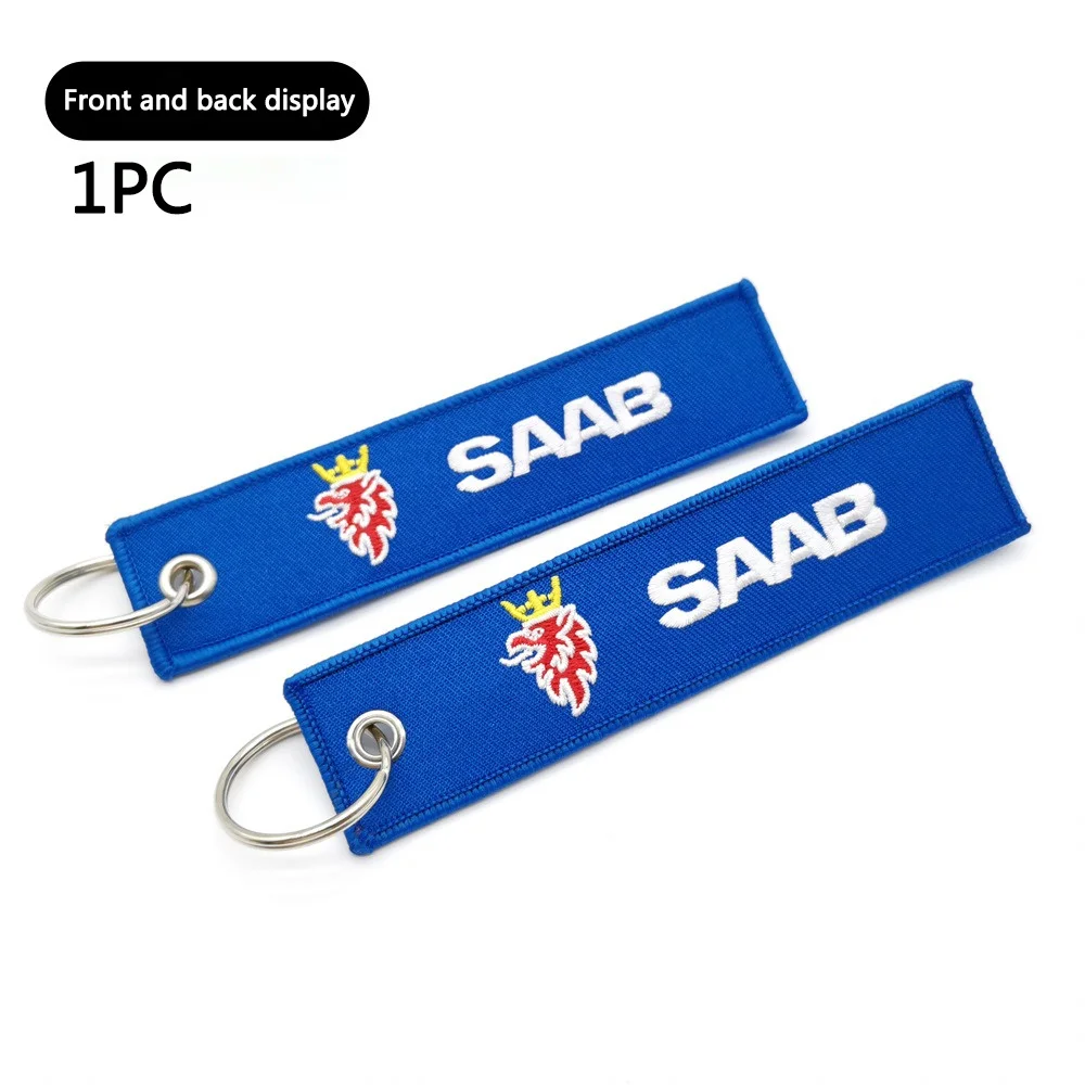 

1 шт. логотип автомобиля, двусторонние вышивки, автомобильный брелок для ключей, индивидуальный модный брелок для ключей, автоаксессуары для SAAB