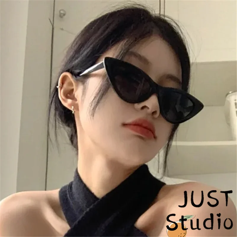 Retro European and American triangular cat eye sunglasses personalized concave shape Spice girl UV protection sunglasses