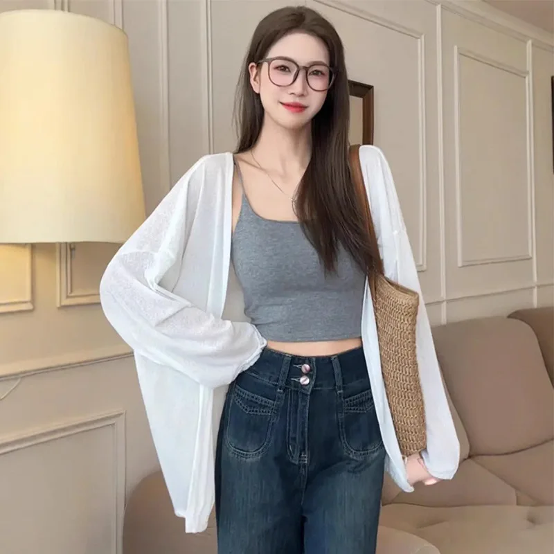 سترة نسائية محبوكة بأكمام طويلة خفيفة الوزن للربيع والصيف على الطراز الكوري فضفاضة تناسب الحماية من الشمس غطاء هوائي أنيق كاجوال