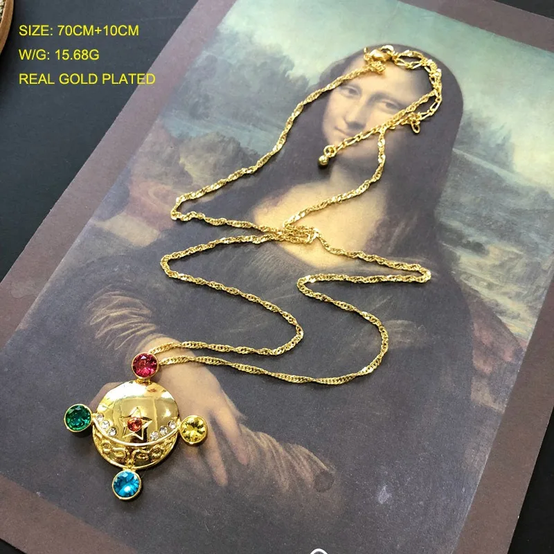 

Western Style Retro Planet Shape Colored Gemstone Diamond Electroplated Real Gold Brooch Sweater Chain