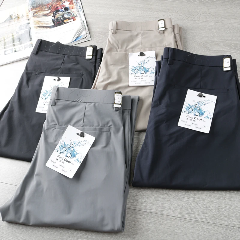 

Прохладные мужские летние тонкие повседневные брюки из шелковой ткани для поездок на работу, брюки прямого кроя без глажки, модные городские брюки...