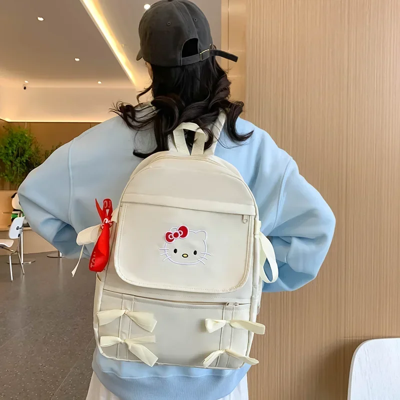 Hello Kitty tas sekolah kupu-kupu wanita, ransel kapasitas besar kartun sekolah dasar Sanrio belakang ganda