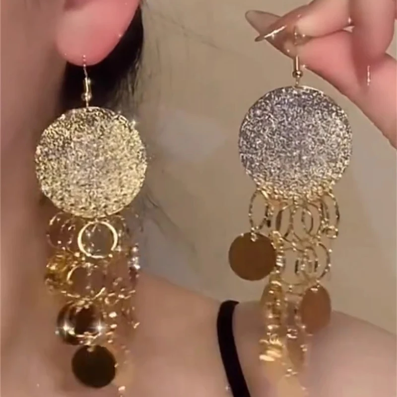 

Personalized long disc fringed pendant light luxury high sense exaggerated stud earrings