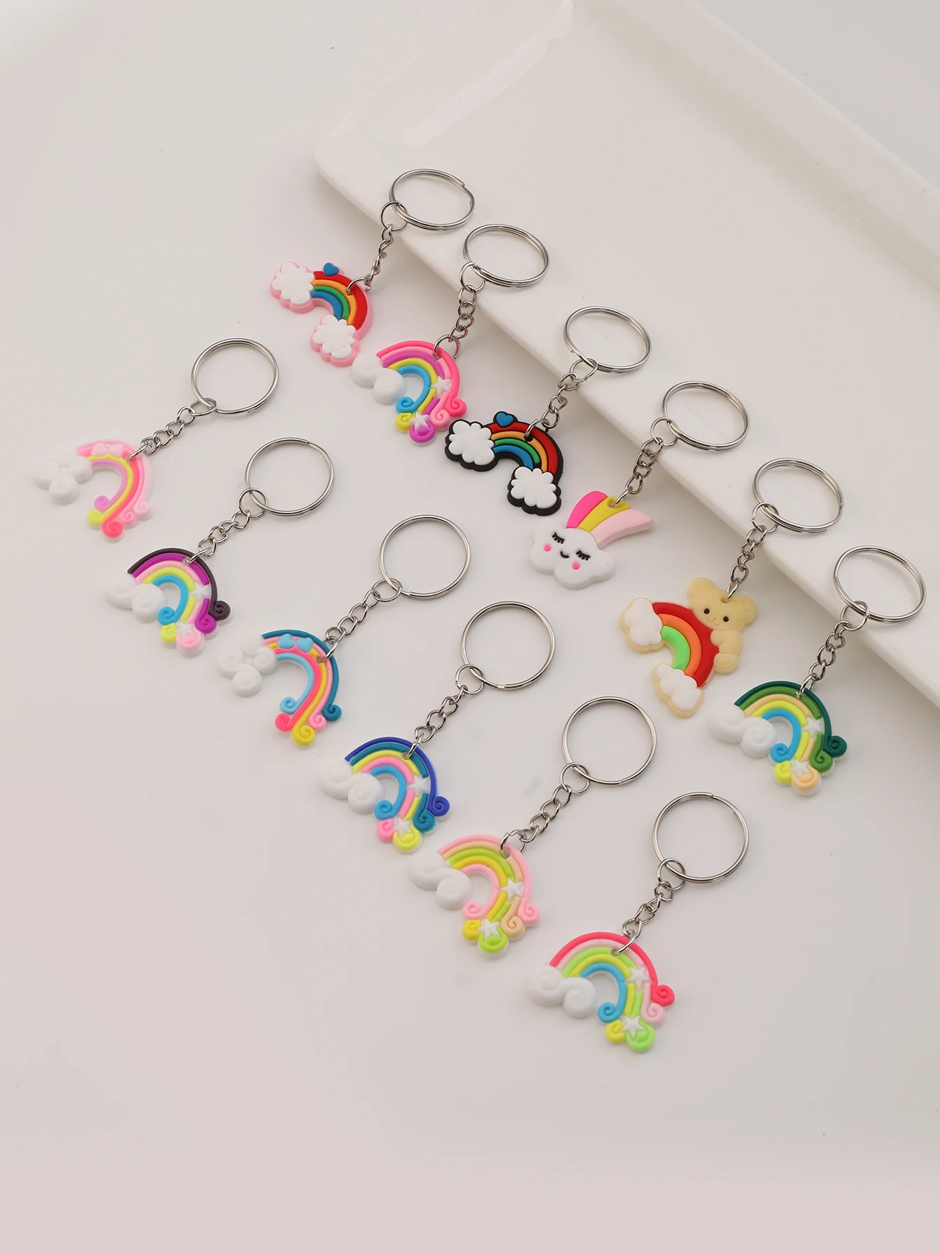 سلسلة مفاتيح كرتونية بألوان قوس قزح من السيليكون PVC ، سلسلة مفاتيح سحابية ، حقيبة محفظة ، سحر حقيبة ظهر ، مستلزمات حفلات أعياد الميلاد ، 12 *