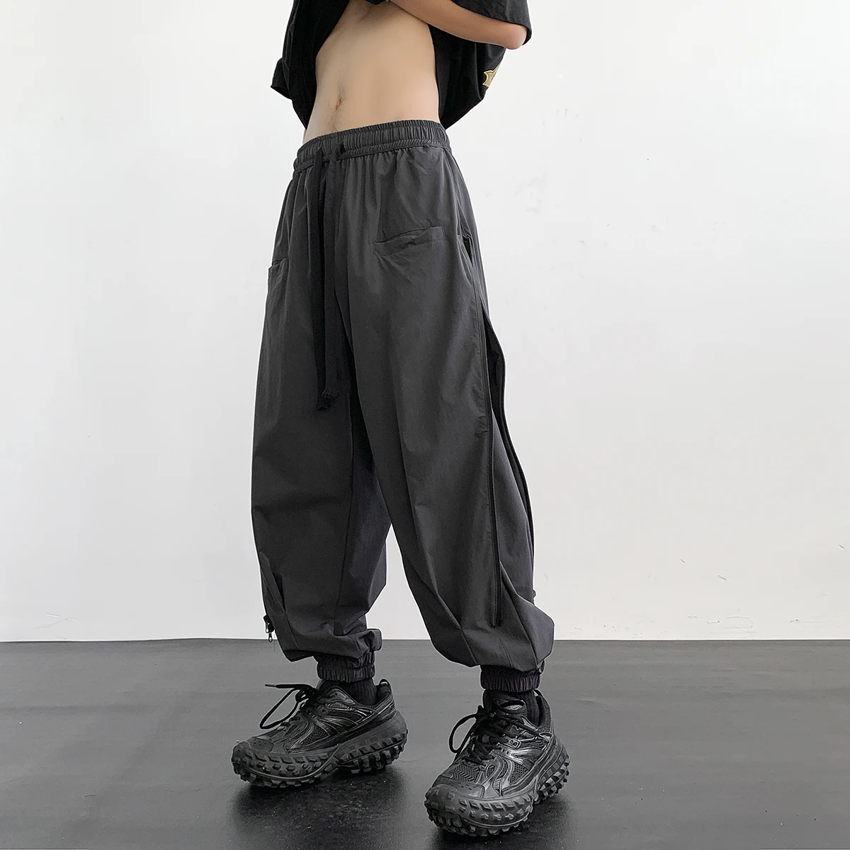 

New Men's Fashion Harem Pants Reverse Design Baggy Tapered Trousers Black Side Zipper Stretch Oversized Hip Hop Clothing Man