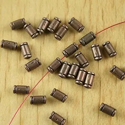 

100pcs 6.1x3.2mm copper-tone crafted spacer beads h2180