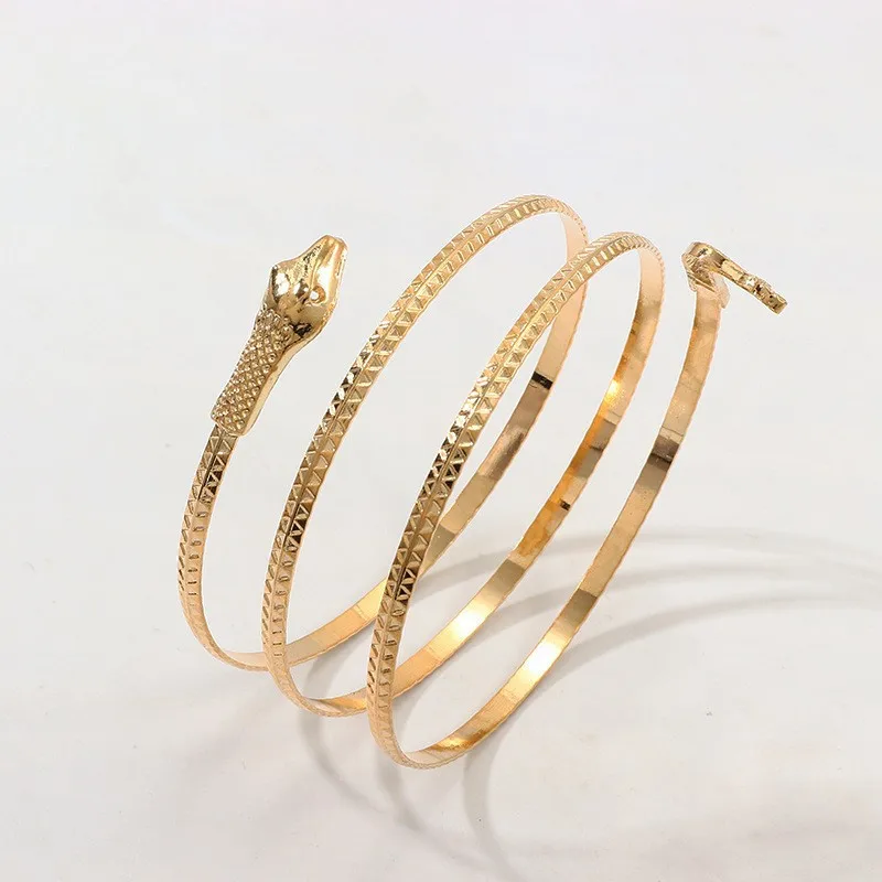 Pulsera de serpiente dorada, brazalete para el brazo, joyería, banda dorada, brazalete para el brazo con forma de serpiente metálica brillante superior para mujer, pulsera en capas, brazalete giratorio