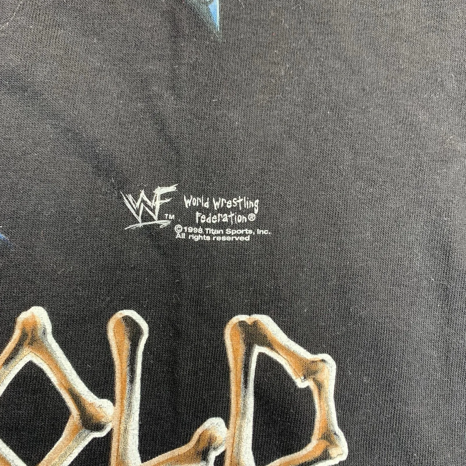 تي شيرت برسومات ستون كولد ستيف أوستن هيكل عظمي لعام 1998 باللون الأسود. علامة التغييرات كبيرة