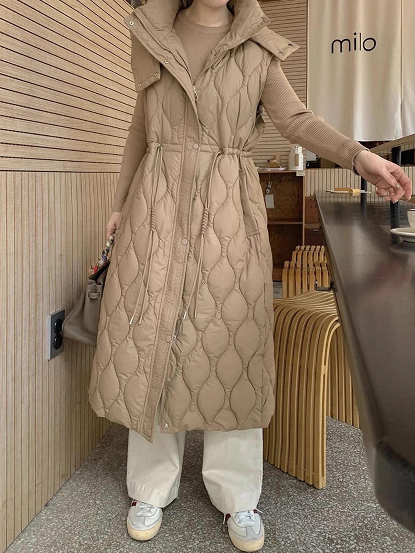 

Clothland Women Elegant Padded Jacket Sleeveless Drawstring Tie Vest Elastic Waist Hooded Winter Outwear Waistcoat CB217