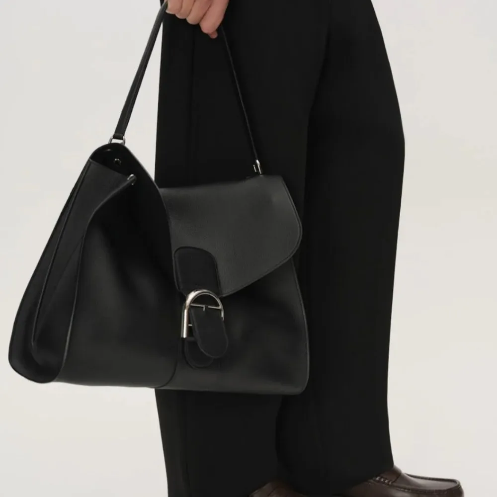 2026 Early Spring New Women's Bags Niche High-end Sense Retro Shoulder Casual Texture Unique Design Fashionable and Versatile