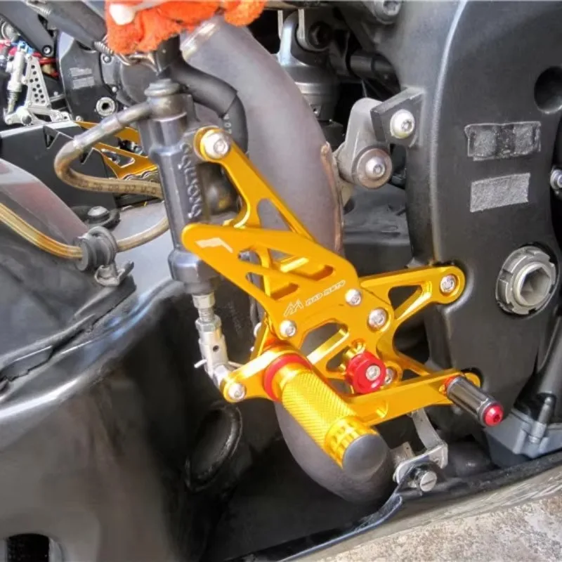 Improved competitive R1 2007-2008 pedal and foot cover assembly for enhanced performance motorcycle accessories
