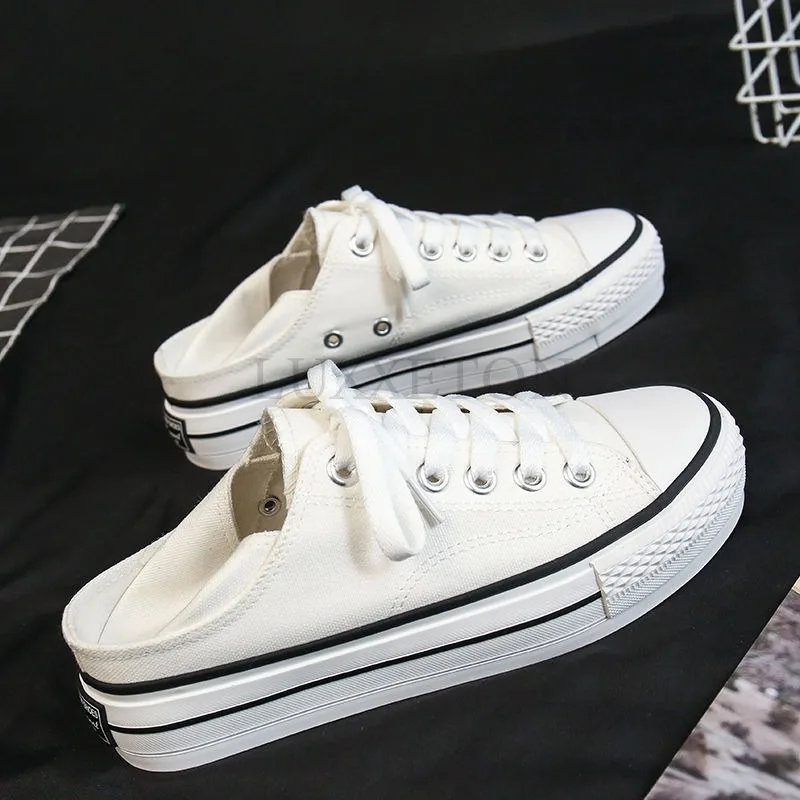 Thick Soled Round Toed Canvas Shoes with Low Cut and Shallow Mouth Two Pairs Worn and One Foot Pedaled with Small White Shoes