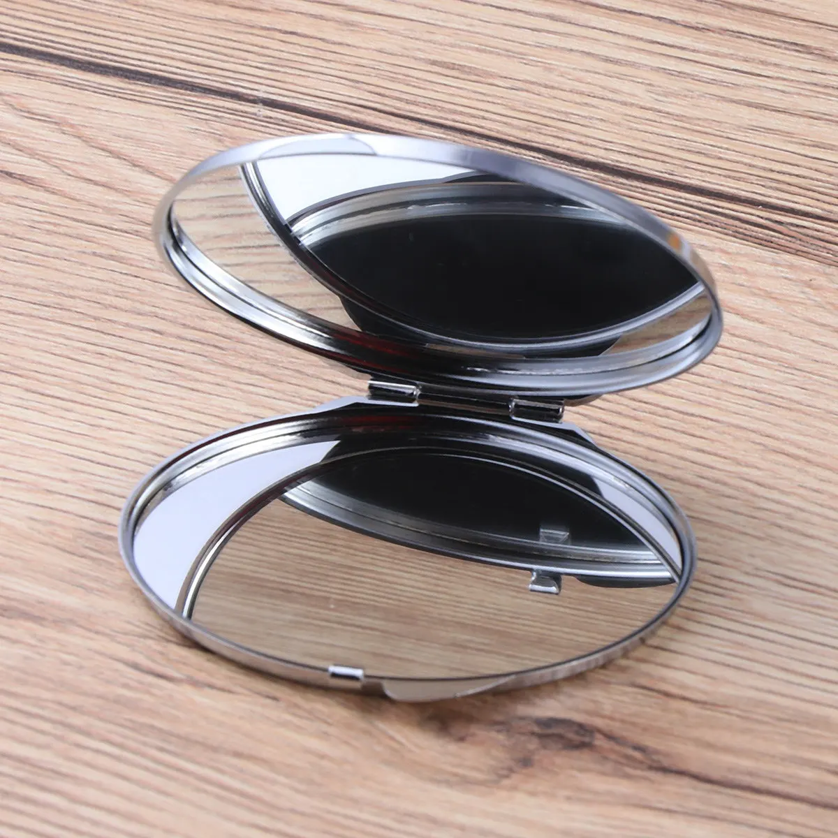 

Compact Folding Makeup Mirror Oval Double Sided Stainless Steel Small Mirror Easy Carry Travel Essential for Women Daily Use