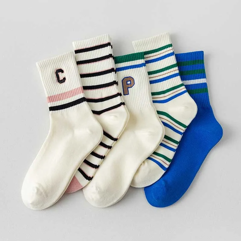 Vendita calda 2023 Trendy Korea Harajuku Socks Street Hip Hop Skateboard Striped Mid Tube Socks calzini in cotone traspirante per ragazze