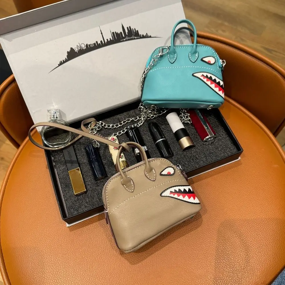 بو الجلود الجديدة الراقية حقيبة قلادة اكسسوارات صغيرة حقيبة أحمر الشفاه لطيف بسيط مفتاح سلسلة ملونة سماعة حقيبة الهدايا