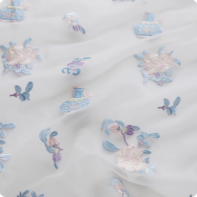 

Embroidered polyester fabric for Chinese-style waistcoat dress top diy fabric