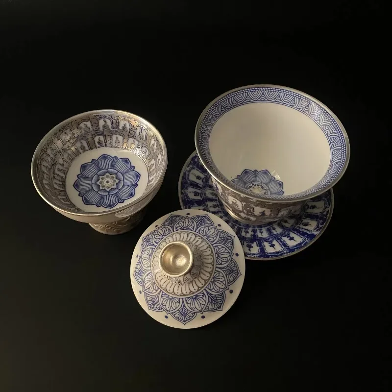 Master craftsman traditions, Chinese glazed pottery, gold-plated silver Buddha statues, covered teacups, inspired Buddhist tea