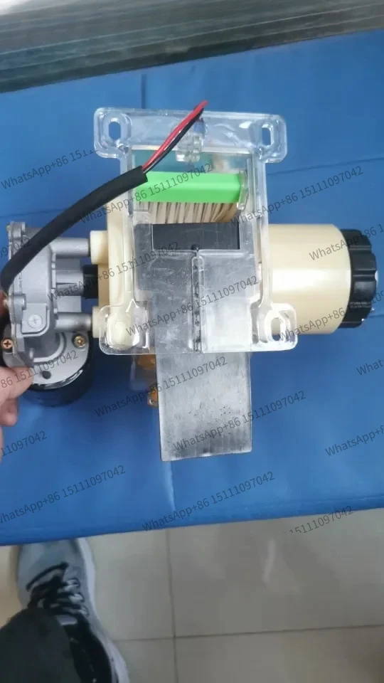 Plastic double-row brush with large insert plate at fertilizer cleaning port of electronic fertilizer applicator