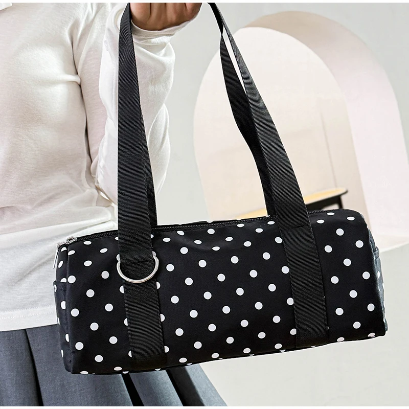 Gepunktete Schultertasche in langem Zylinderformat, Damen-Handtasche mit Tragegriff, zylindrische, leichte, schicke Tragetasche für den Arbeitsweg – Detail 12