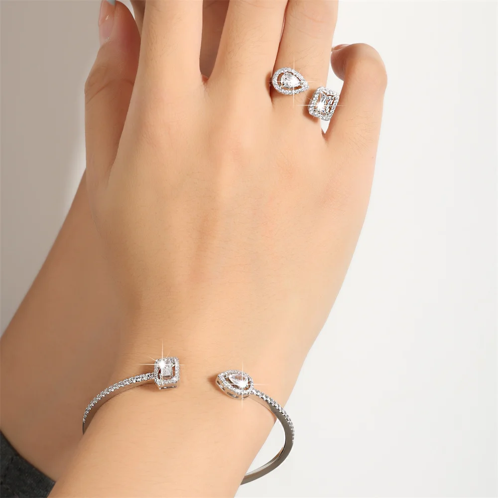 ZAKOL 2-teiliges Set Luxuriöses Geometrisches Quadratisches Wassertropfen-Armreif- und Ring-Set für Damen mit AAA-Zirkonia Hochzeitsschmuck – Detail 7