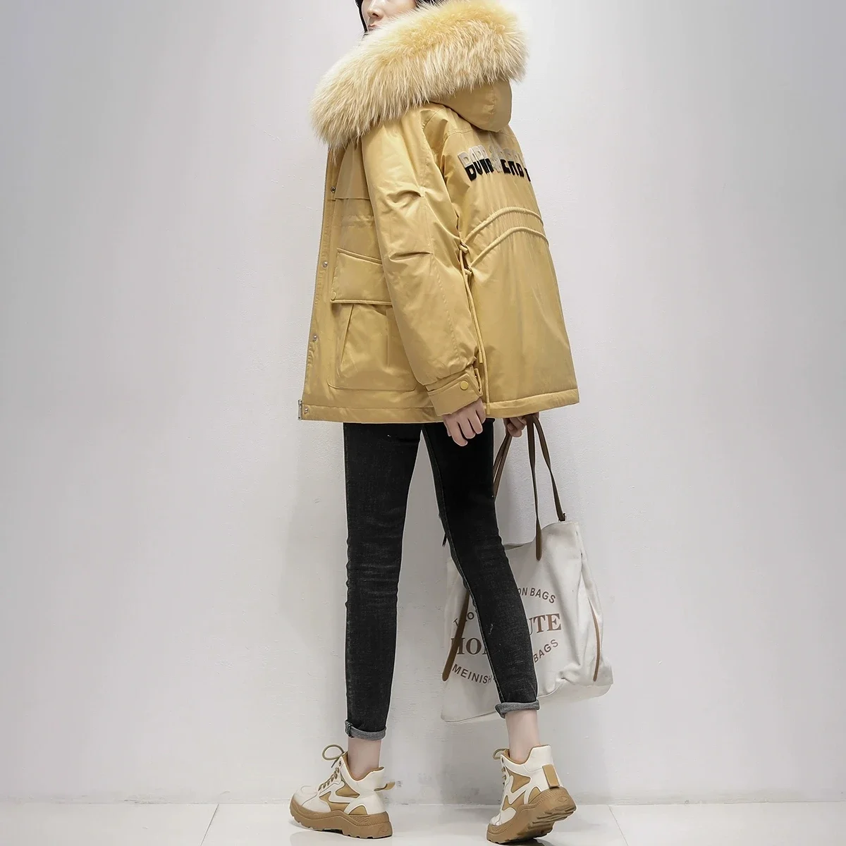 2025 inverno nuova versione coreana delle donne allentato grande collo di pelliccia moda piumino d'anatra bianca corto piumino spesso femminile caldo Parka