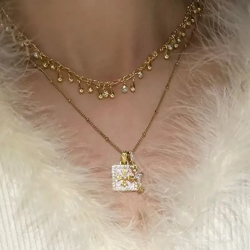 

Квадратный крест Цветочное ожерелье Крест Двойной кулон Мужские и женские классические модные брендовые девушки