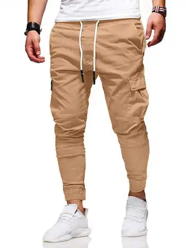 Otoño e Invierno bolsa de parche tridimensional pantalones de pie pequeño lazo cuerda elástica deportes pantalones caídos pantalones largos casuales jogging pan