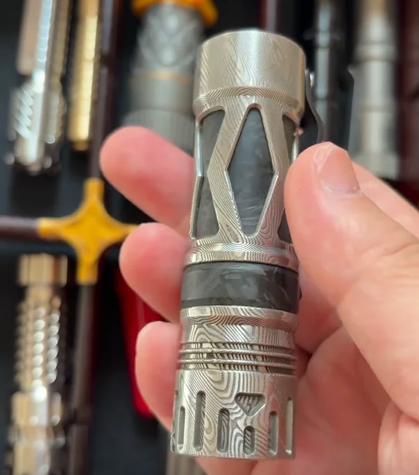 Used EDC clone damascus Flashlight Outdoor Tools Strong Light Torch Lamp Decompression Toy