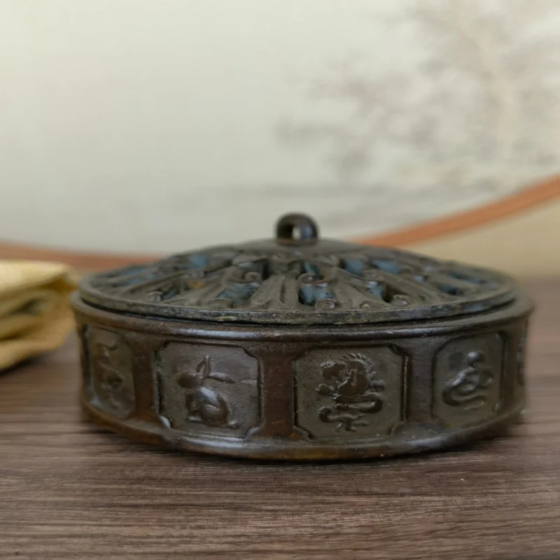 with the twelve zodiac signs, vintage patina, suitable for home, study, or office, decorative incense burner