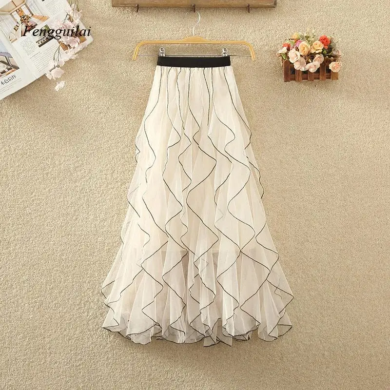 

Wavy Patterned Netted Half-Length Skirt for Women In Summer, with A Waistline and Frilly Edges At The Hem.