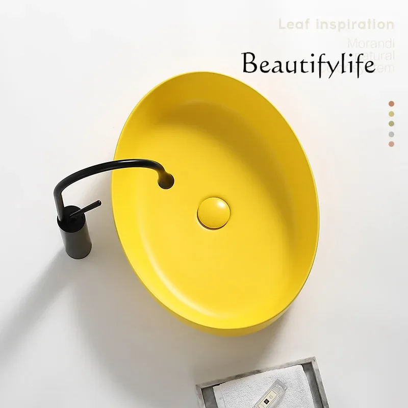 Nordic matte yellow countertop basin oval household ceramic wash basin bathroom balcony washbasin surface