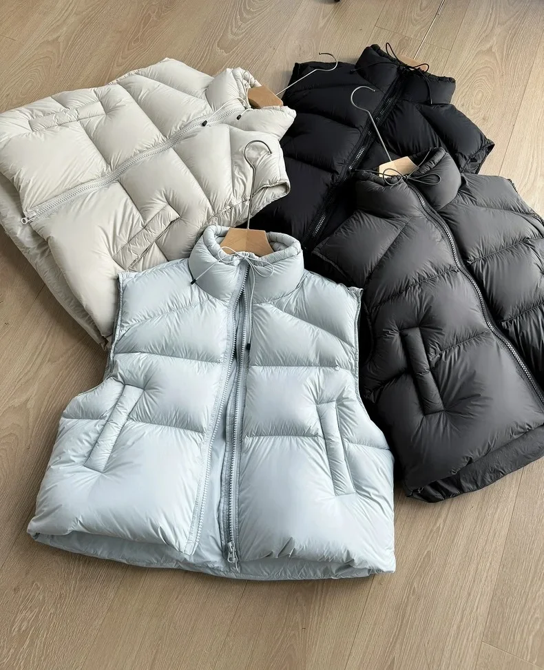 

Осенне-зимний новый женский пуховый жилет с воротником-стойкой, короткий пушистый белый топ на утином пуху