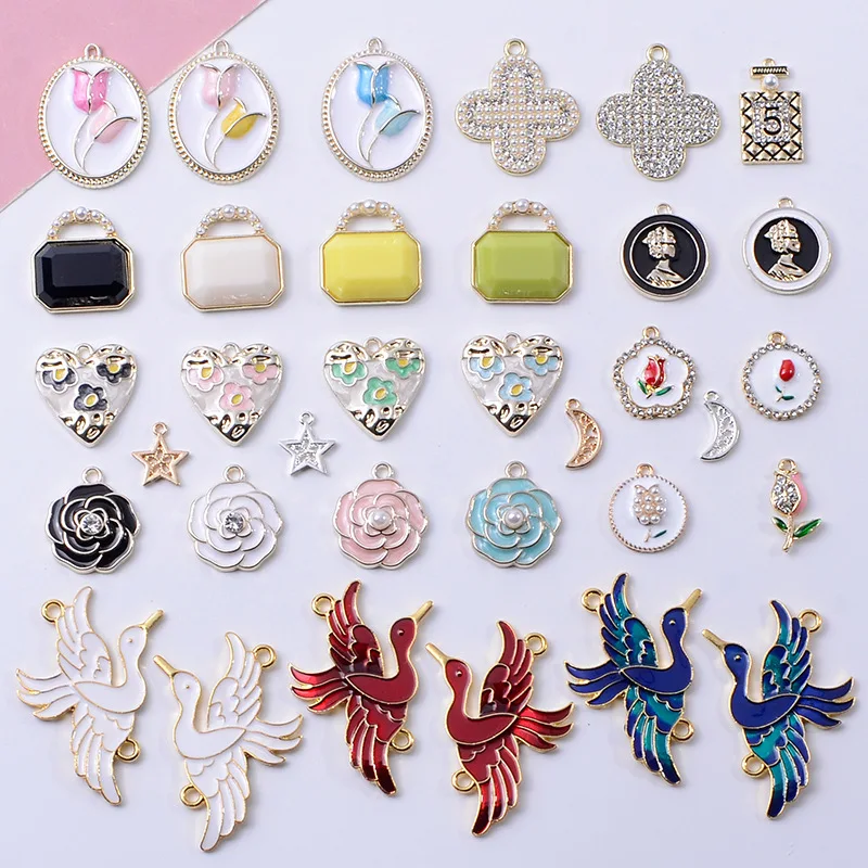 

100Pc set symmetrical crane color tulip alloy jewelry pendant crystal handbag DIY handmade materials direct supply