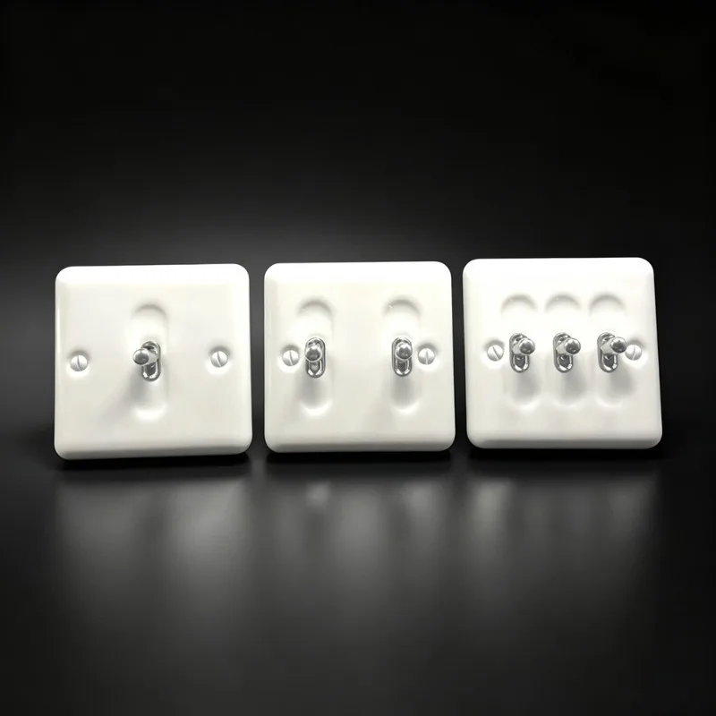 vintage-white-ceramic-wall-switch-–-european-style-toggle-light-switch-featuring-a-brass-lever-and-faceplate-10a-250v