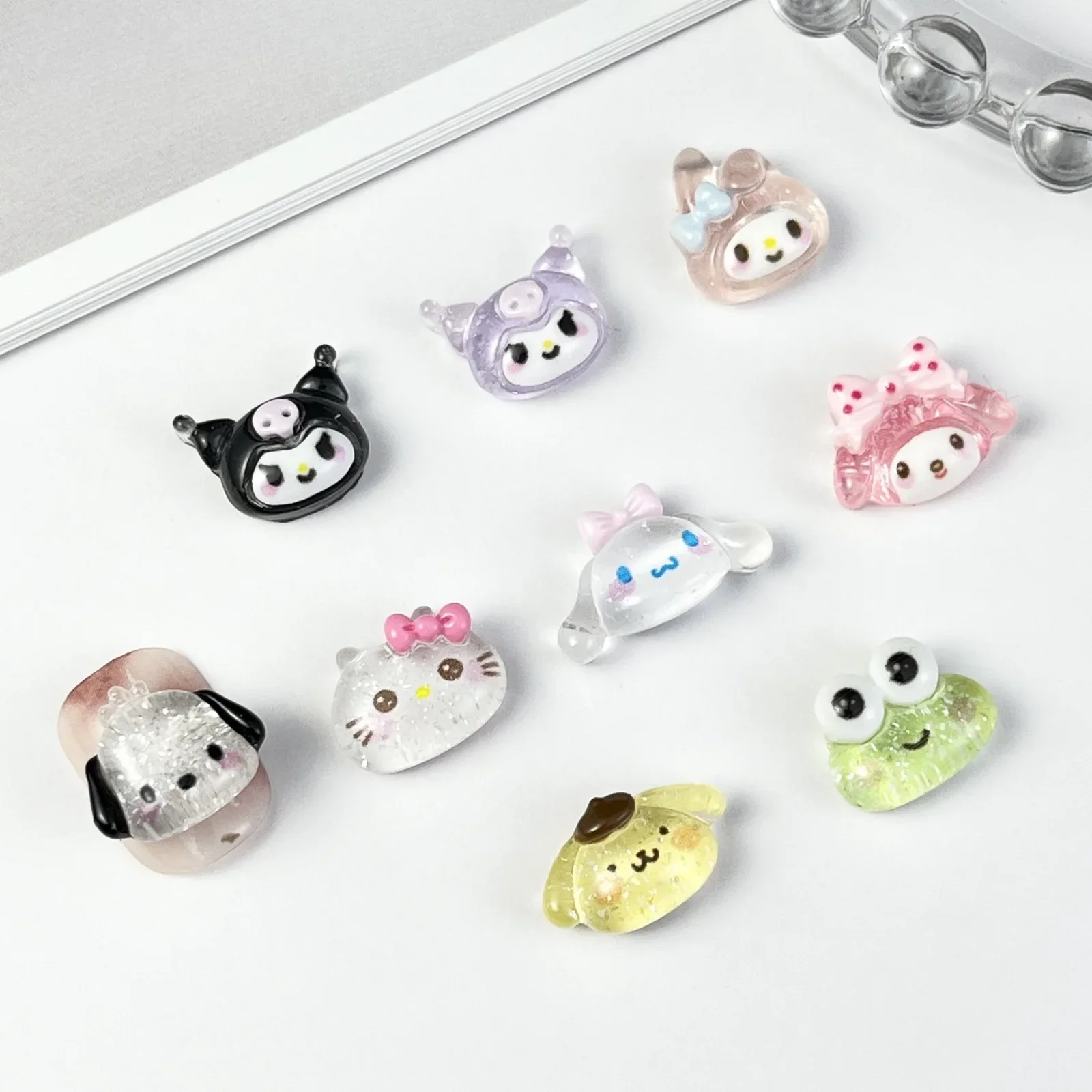 20pcs Sanrio Nail Art Cartoon Jewelry Sanrio Hand-painted Resin Nail Charms Hello Kitty Kuromi Pochacoo Forg Nail Accessories