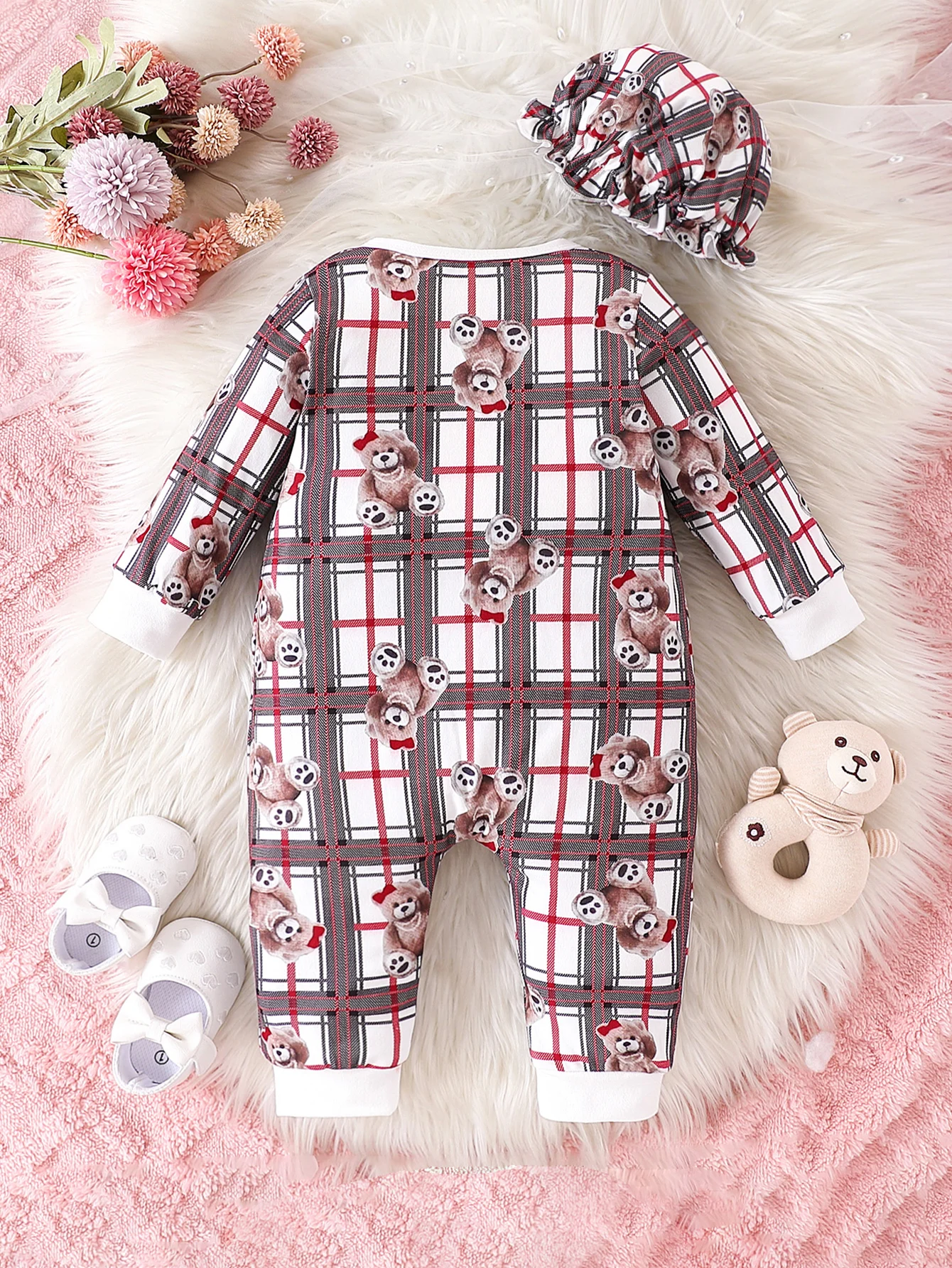 Cute baby girl in plaid print overalls with a round neck and long sleeves; includes a hat for autumn and winter.