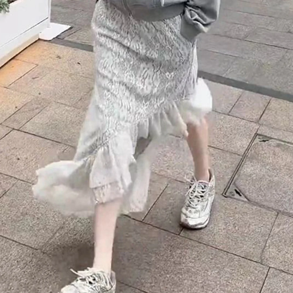 

French niche lace splicing design sense thin skirt 2025 new age-reducing irregular fishtail skirt women